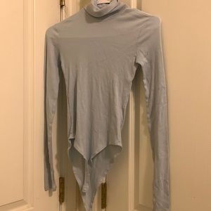 Light weight, light blue H&M long sleeved ribbed turtle neck body suit.